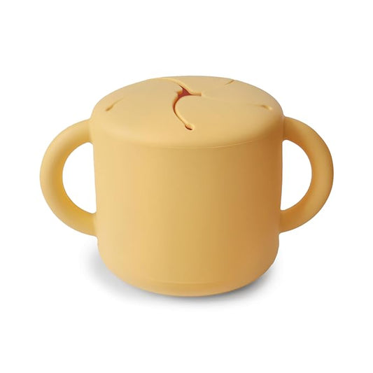 mushie Silicone Snack Cup | Spill Proof Food Container for Toddler and Baby (Daffodil)